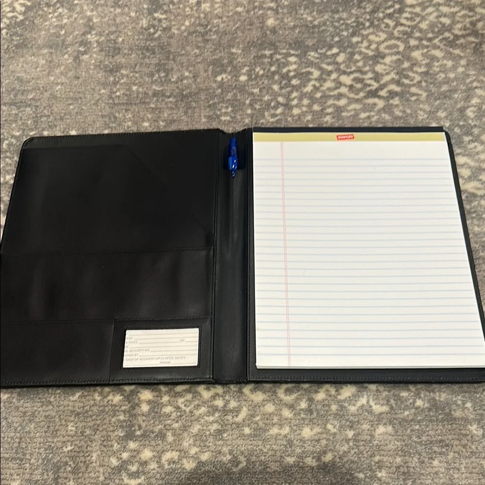 Black folder for paper pen and accessories. Legal size.